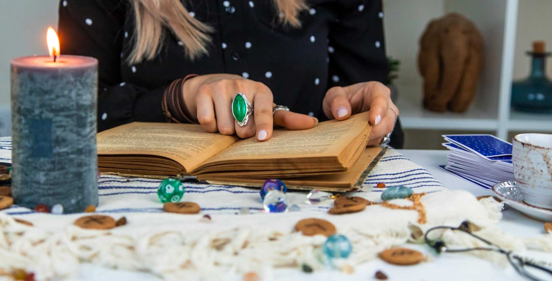 woman fortune teller reads a book of spells selec 2023 11 27 04 52 13 utc